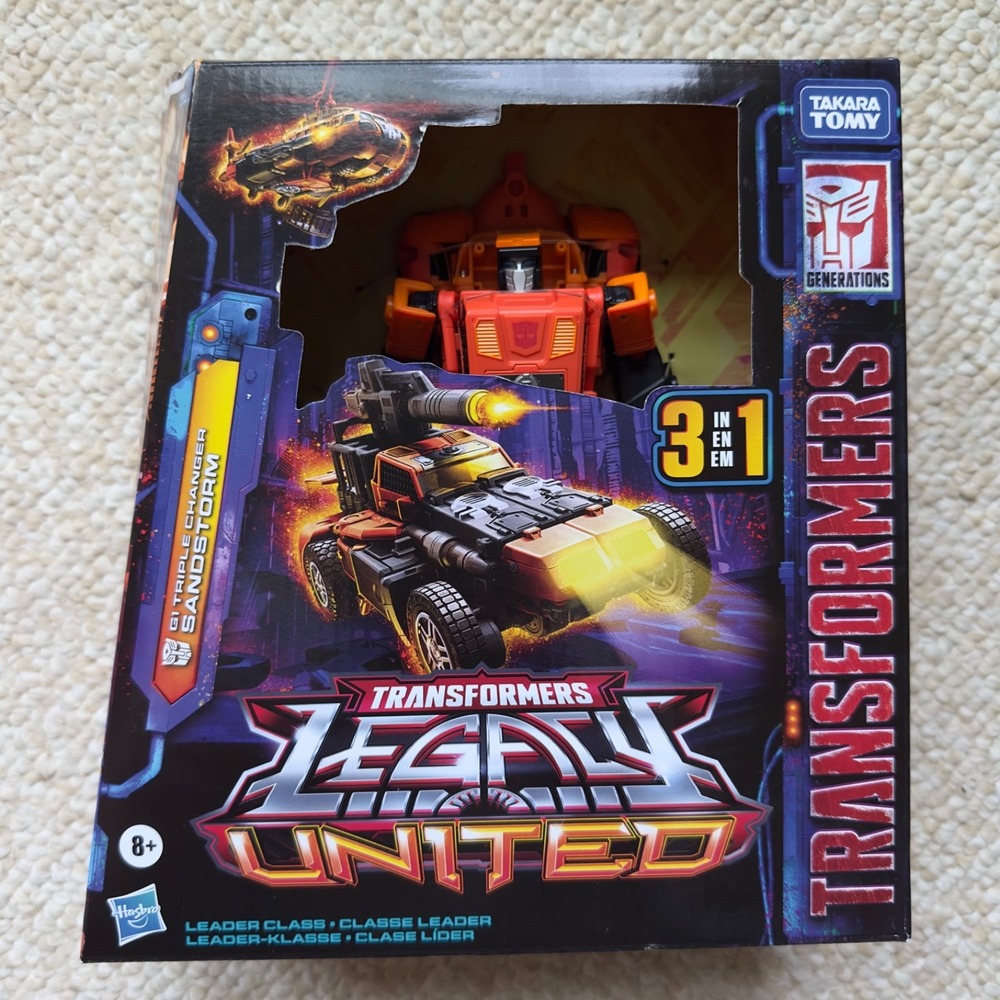 Transformers Legacy United - Leader Class G1 Triple Changer - SANDSTORM, NEW